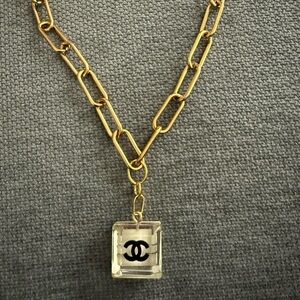 Square Resin Black Logo Pendant on Gold Paperclip Chain